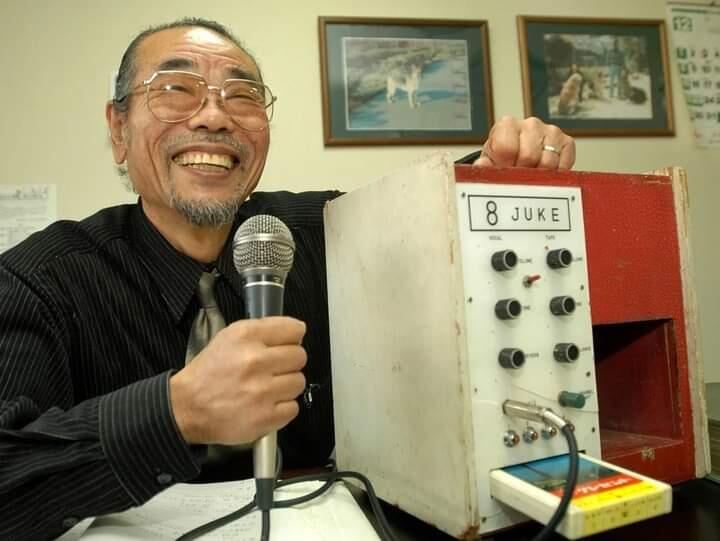 Daisuke Inoue with an early Japanese karaoke machine