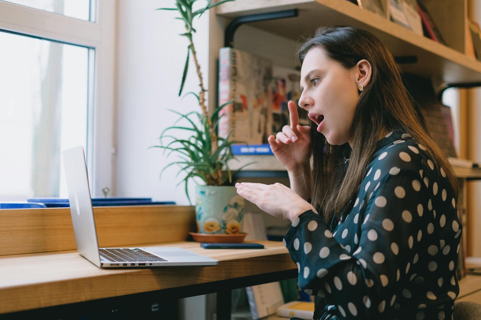 Student learning ASL on her computer.