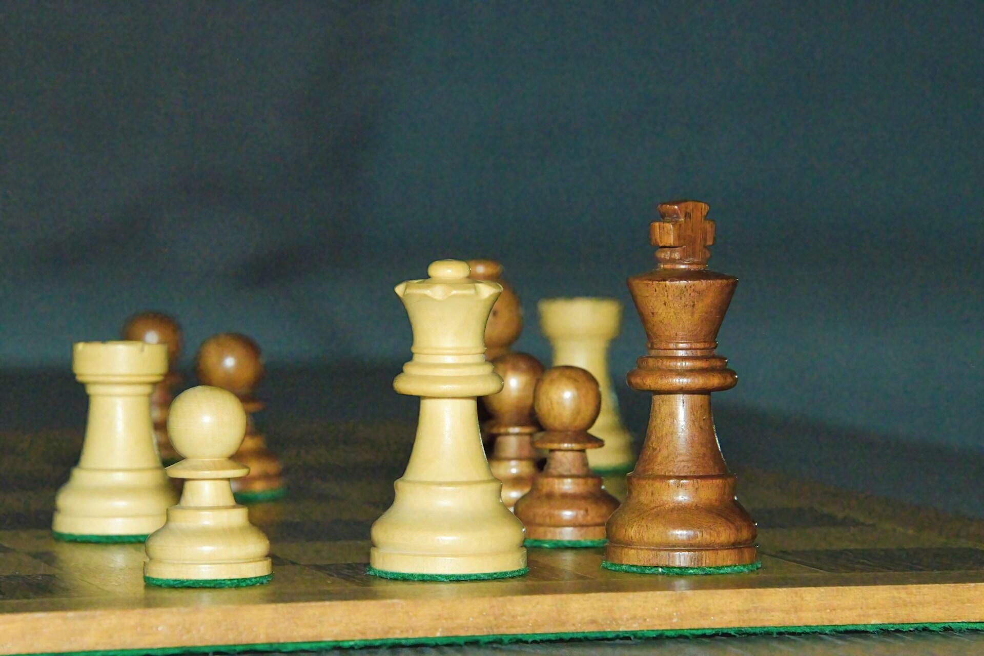 Chess pieces on a board.