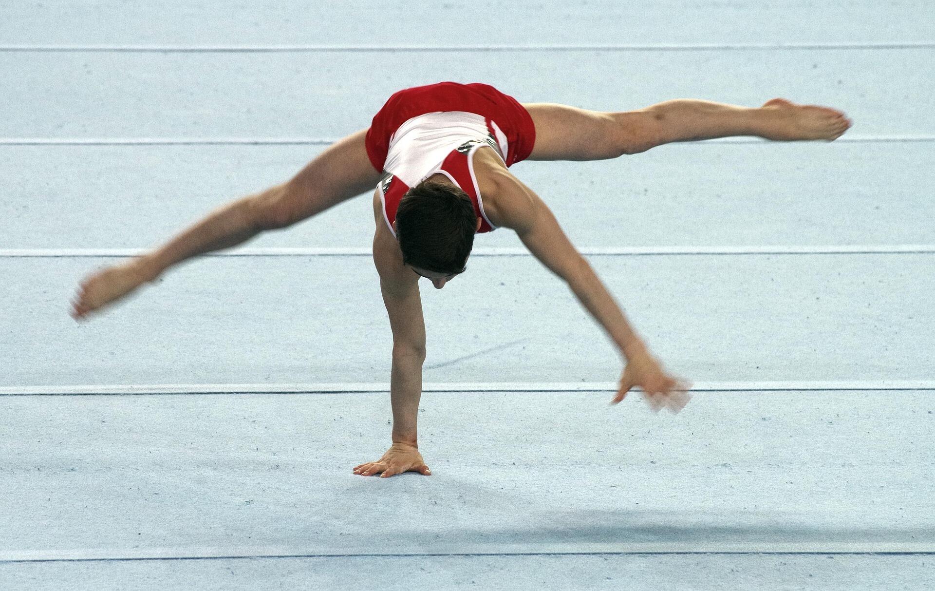 Hand stand floor gymnastics routine.