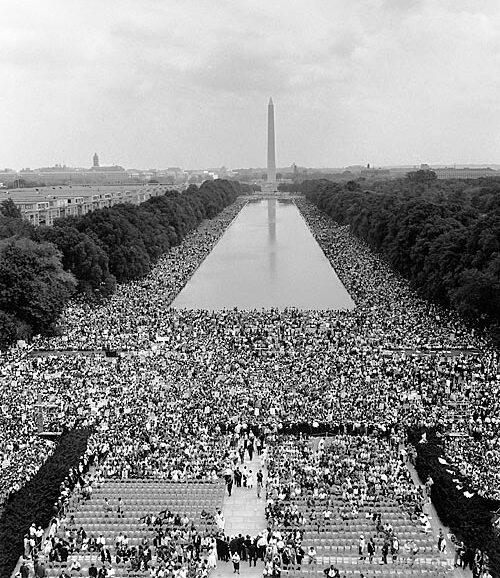 A black and white photo of the crowd of thousands of people at the March on Washington.
