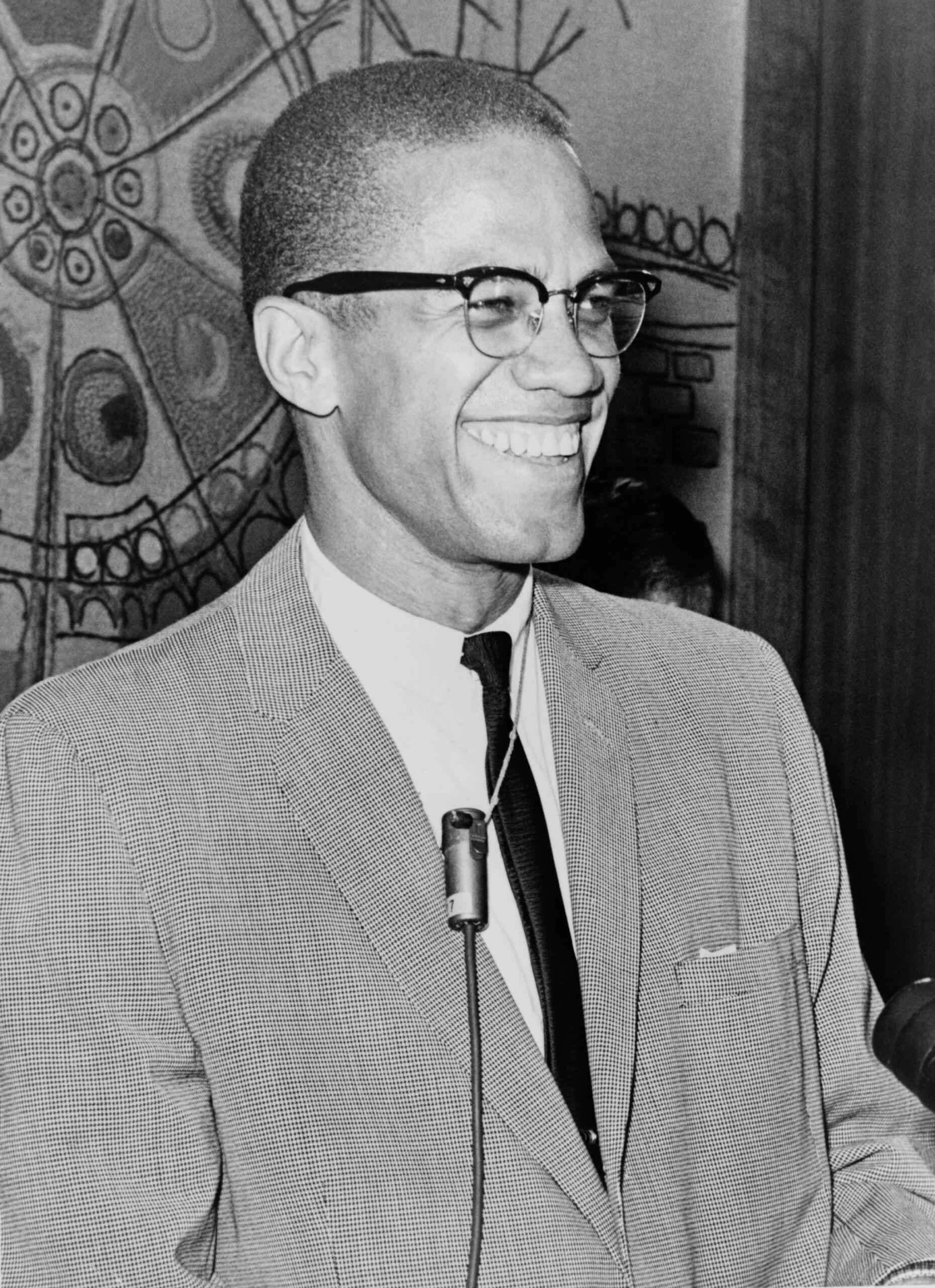 Malcolm X smiling
