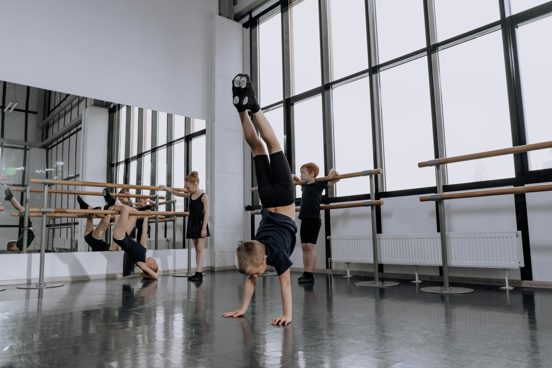 Floor gymnastics training session for kids.