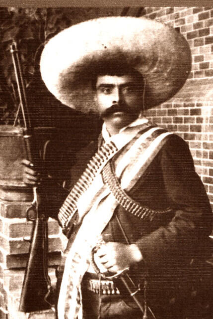 A black and white photo of Emiliano Zapata