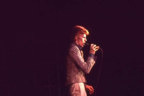 David Bowie performing on stage