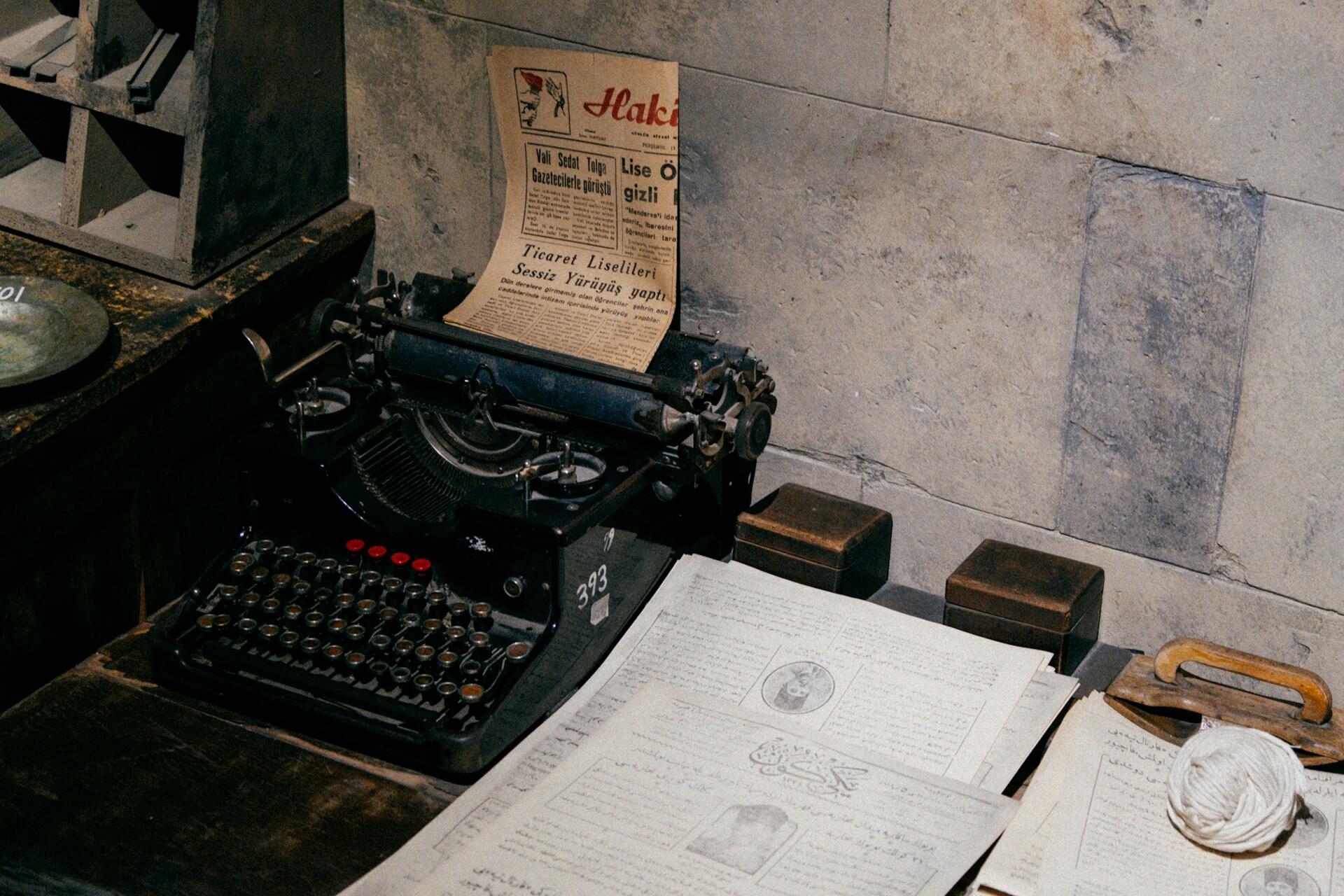 Typewriter and old history papers.