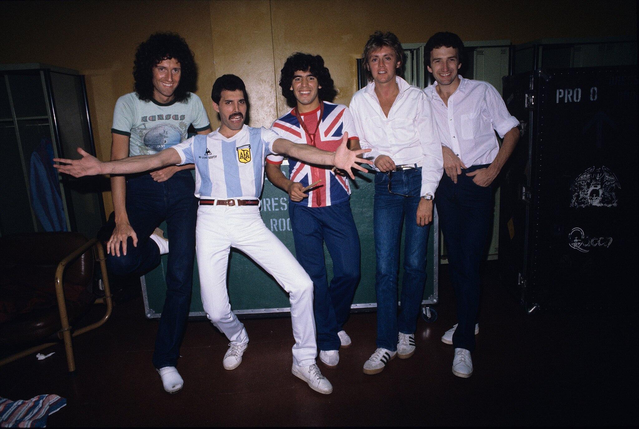 Queen in soccer (football) jerseys with Diego Maradona