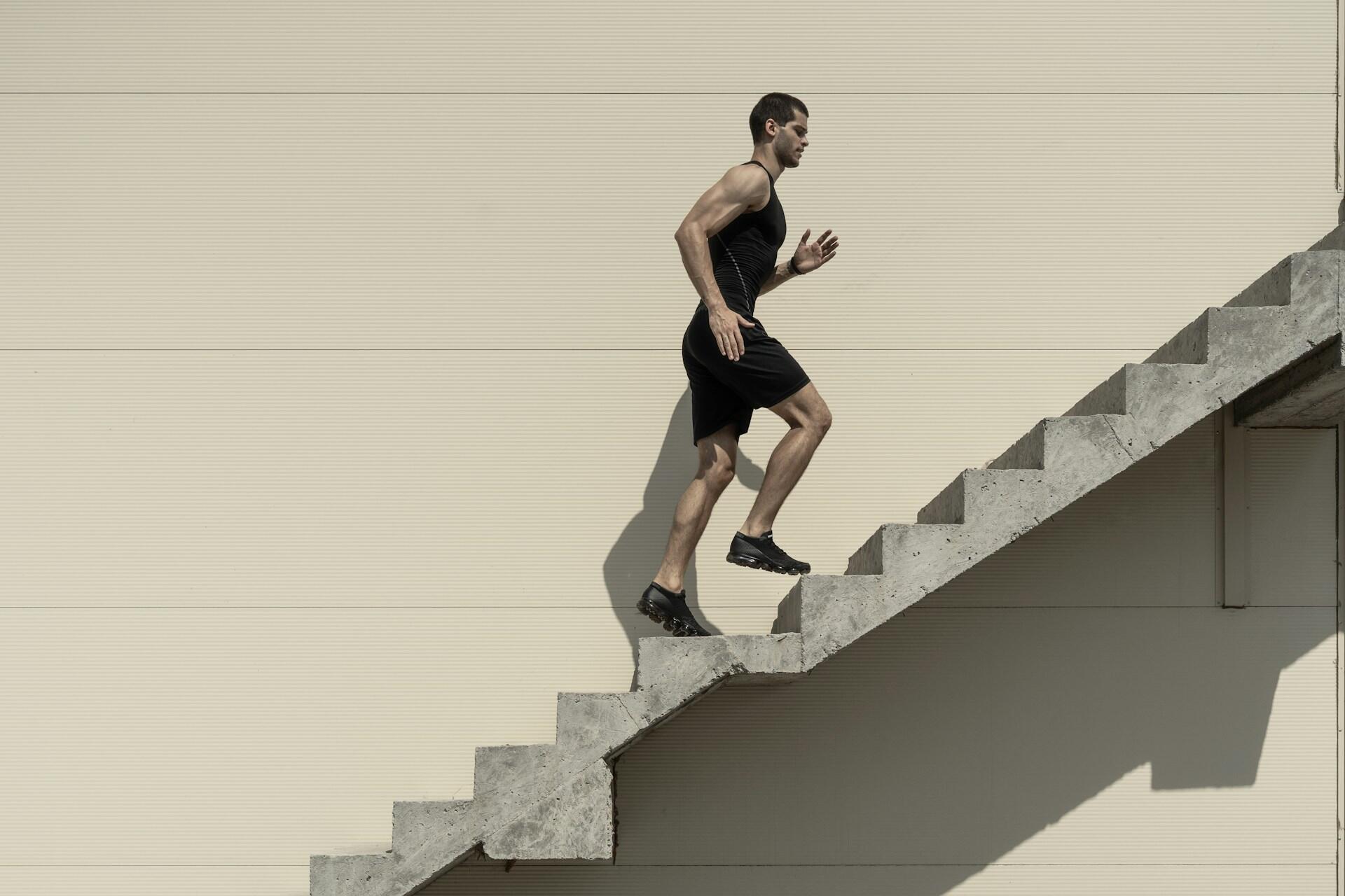 A man running up the stairs.