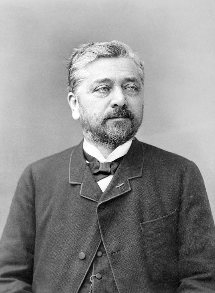 A black and white portrait of Gustave Eiffel.