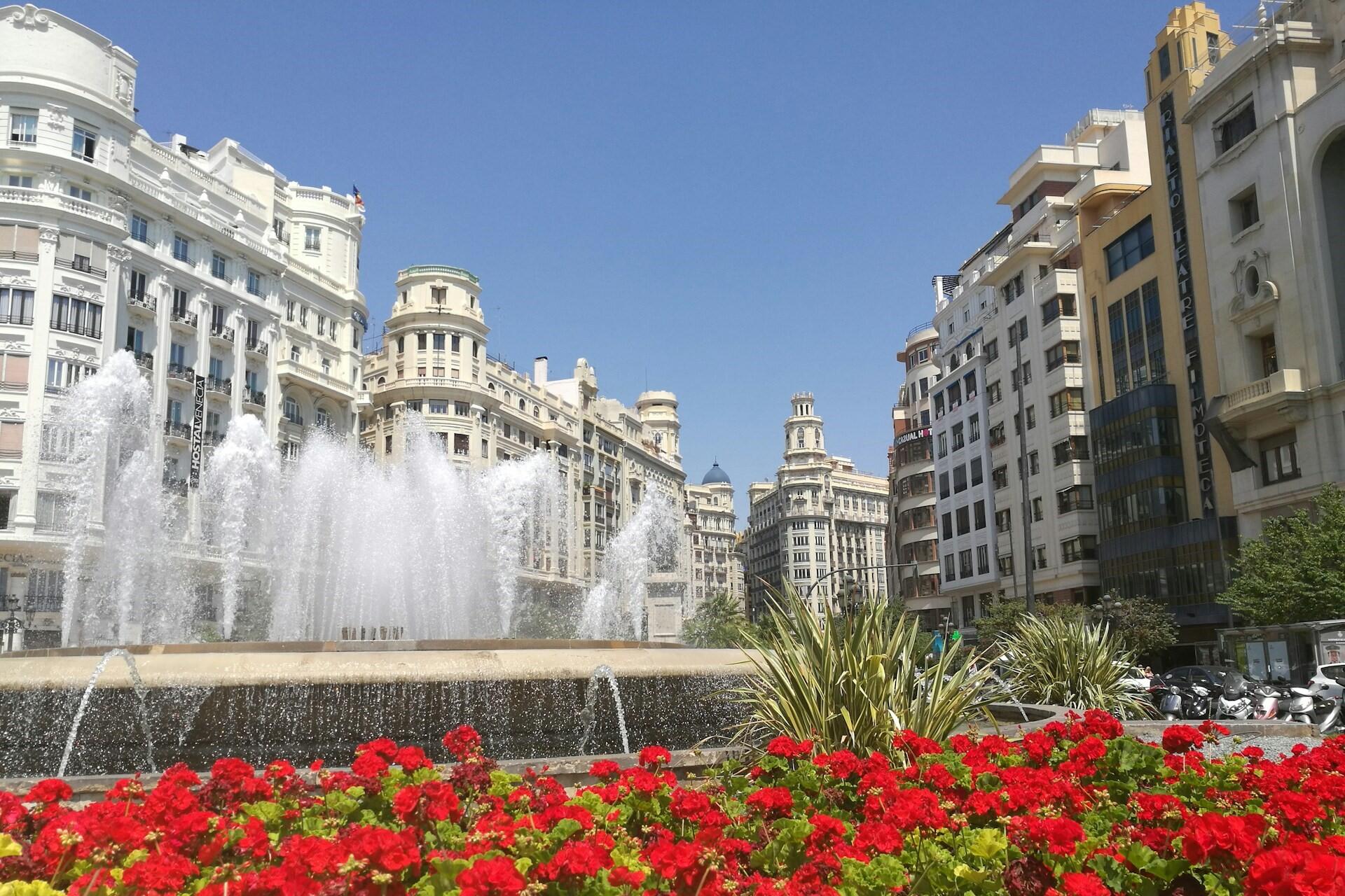 Flowers and a fountain in Madrid, Spain.