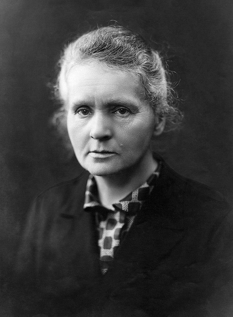 Marie Curie in a black and white portrait.