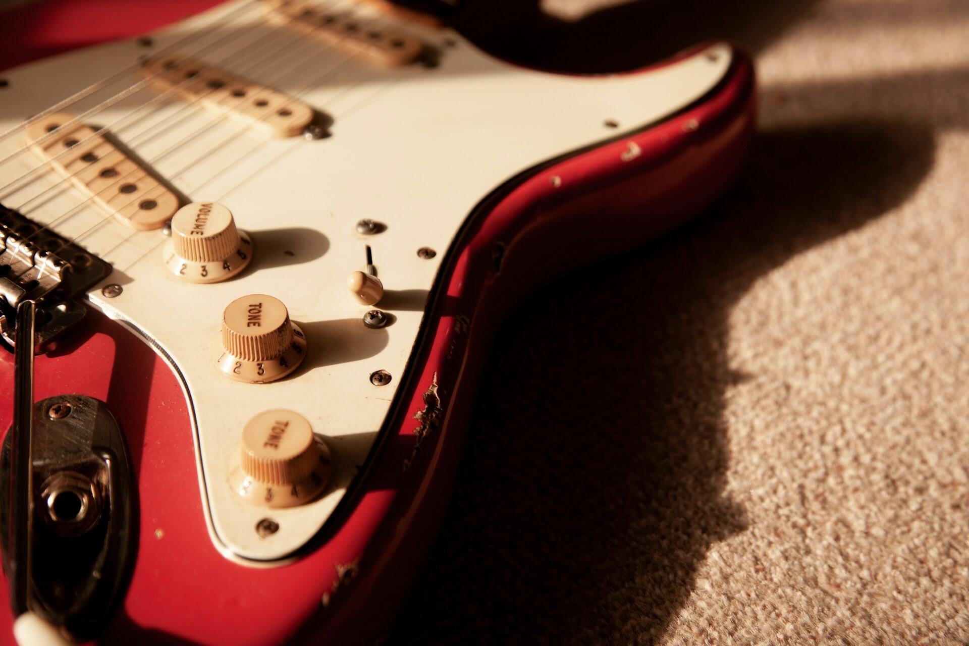 A red Fender Stratocaster.