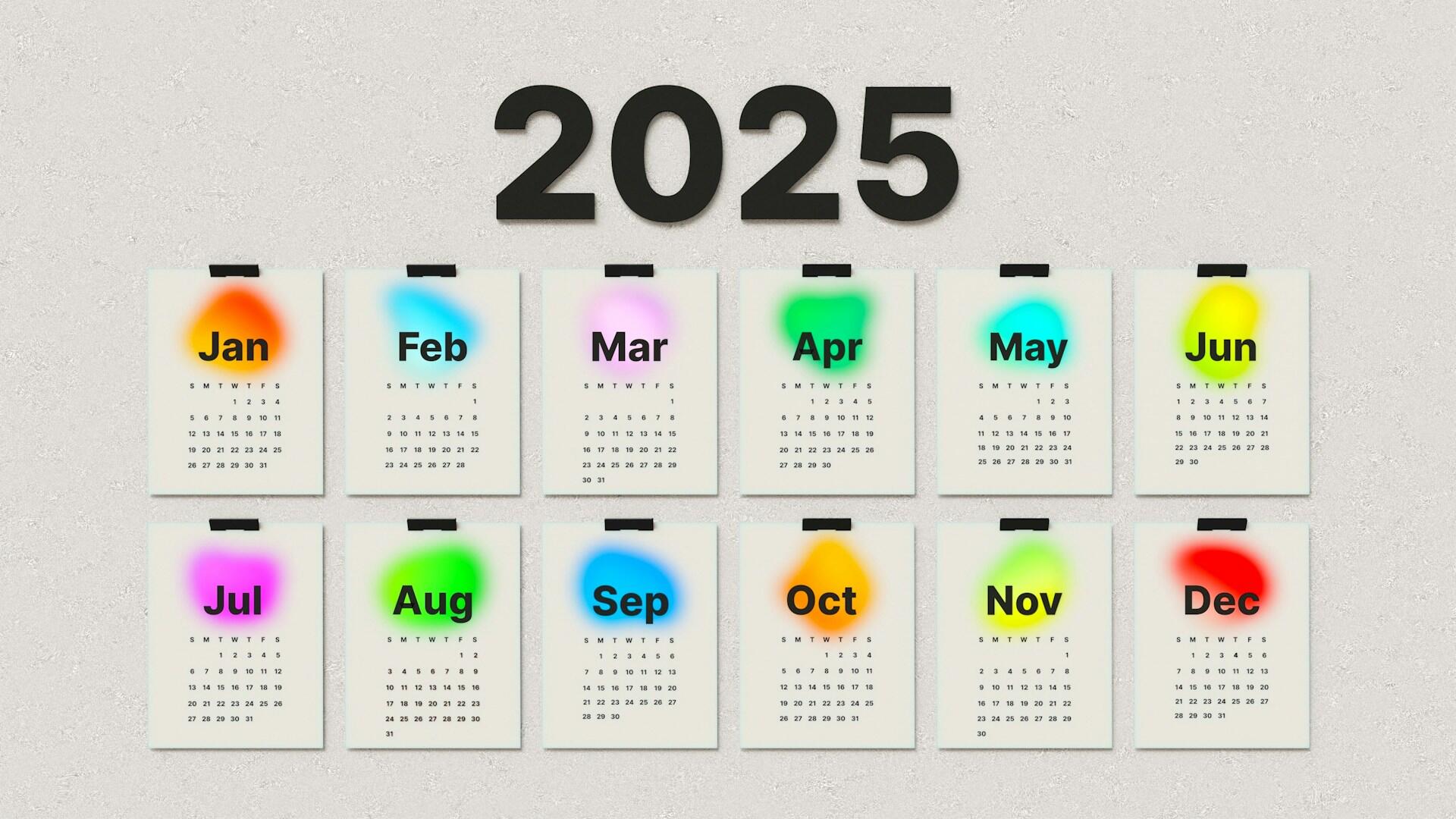 a wall with all 12 months of the calendar posted side by side