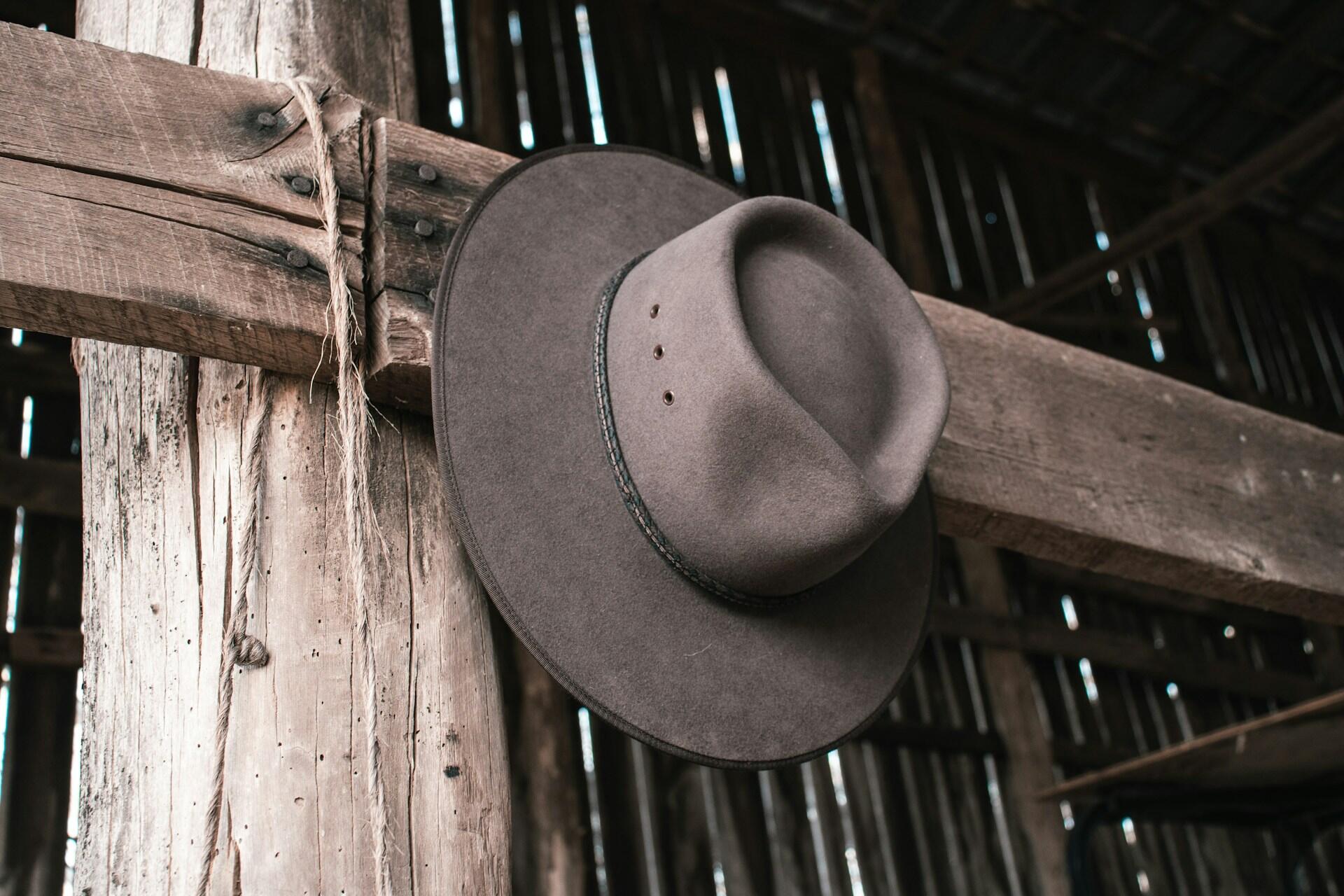 A cowboy hat hanging up.