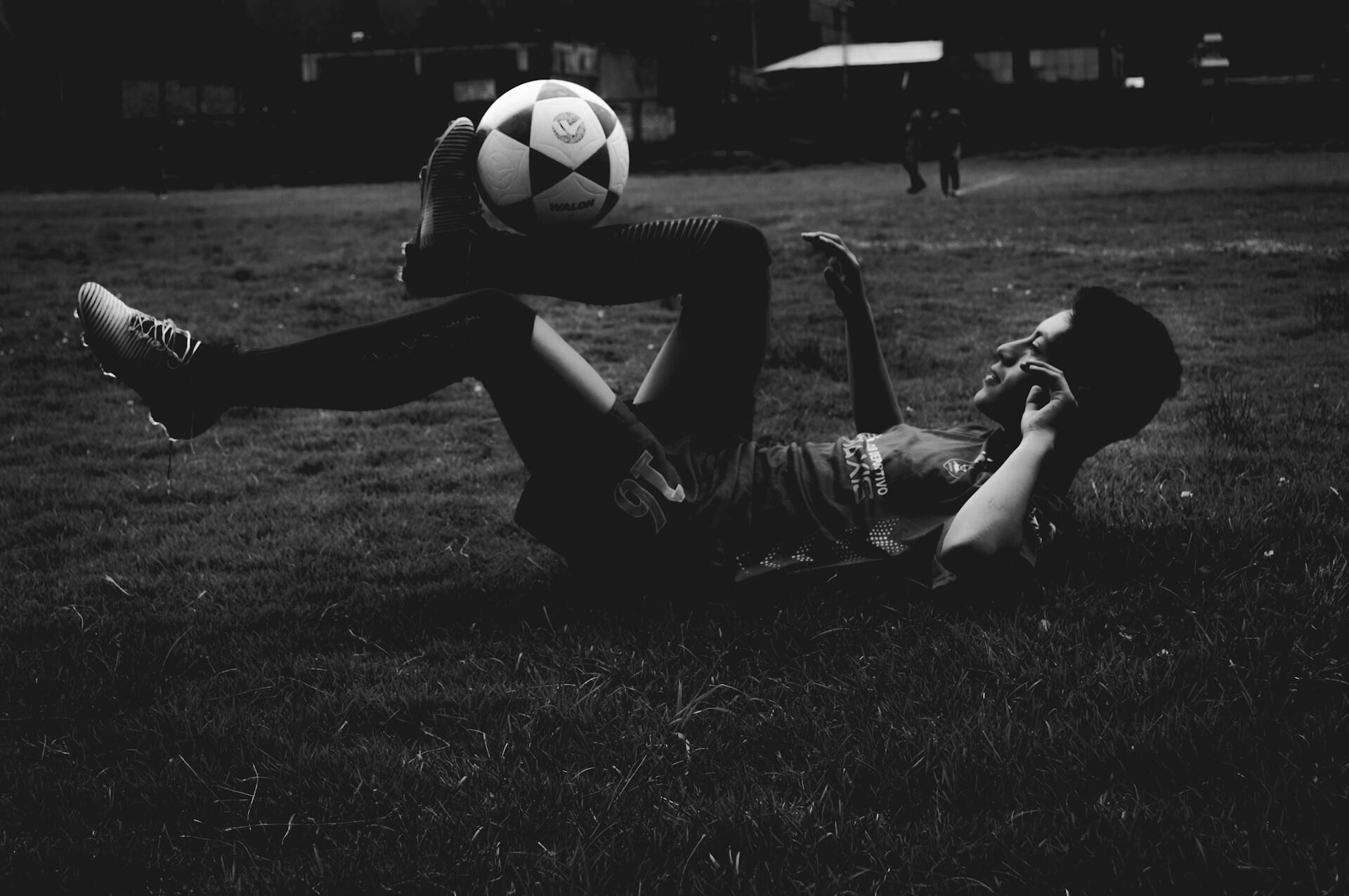 man playing with soccer ball