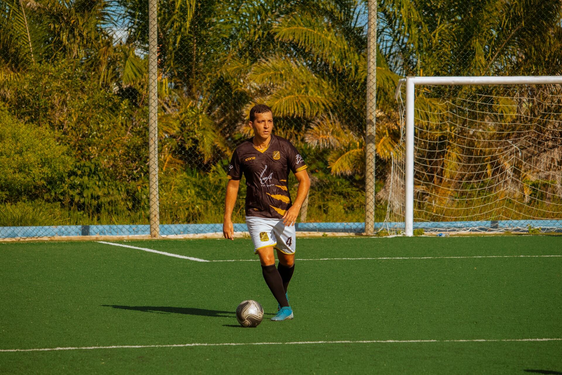 man playing with soccer ball
