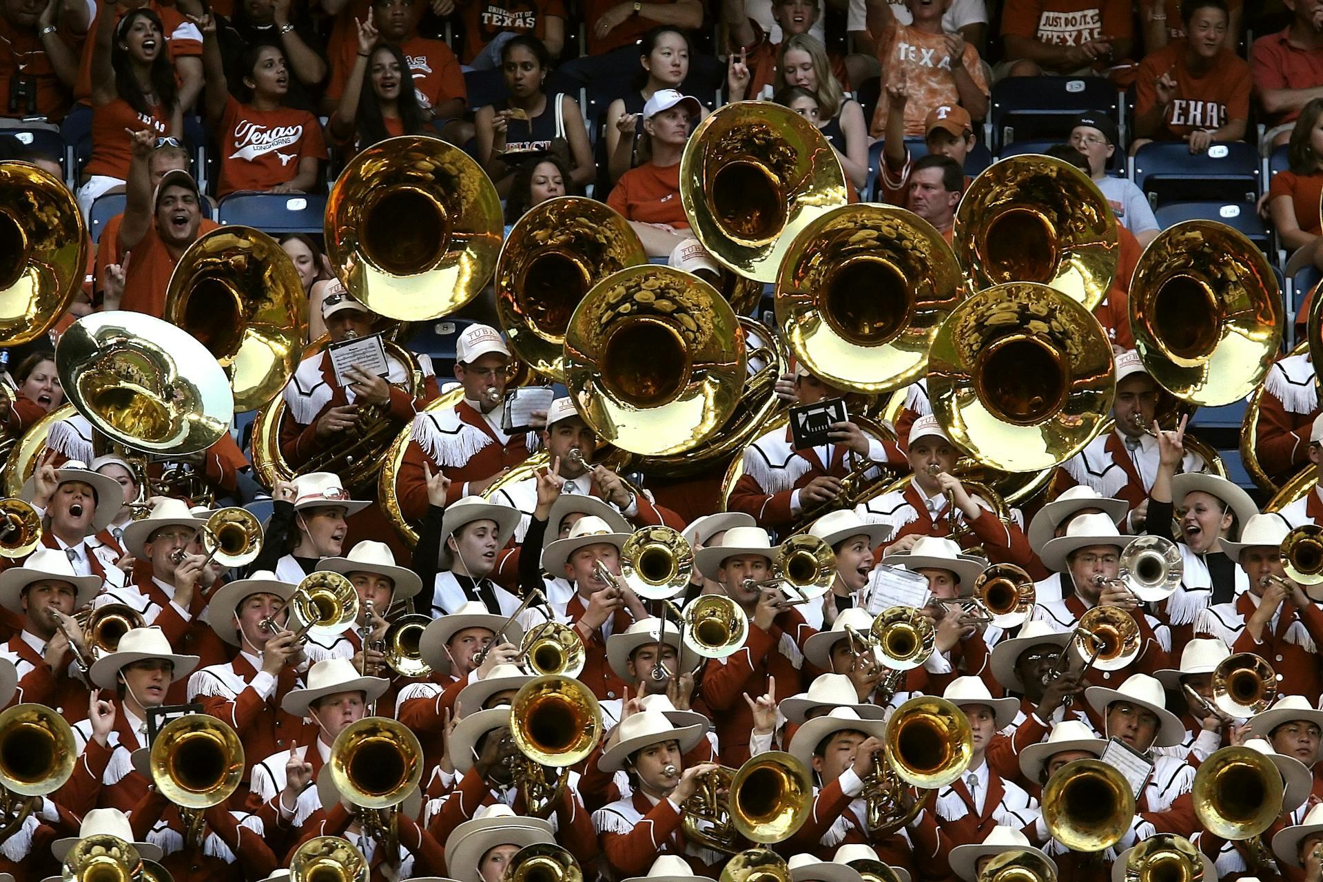 The brass section of a marching band all together
