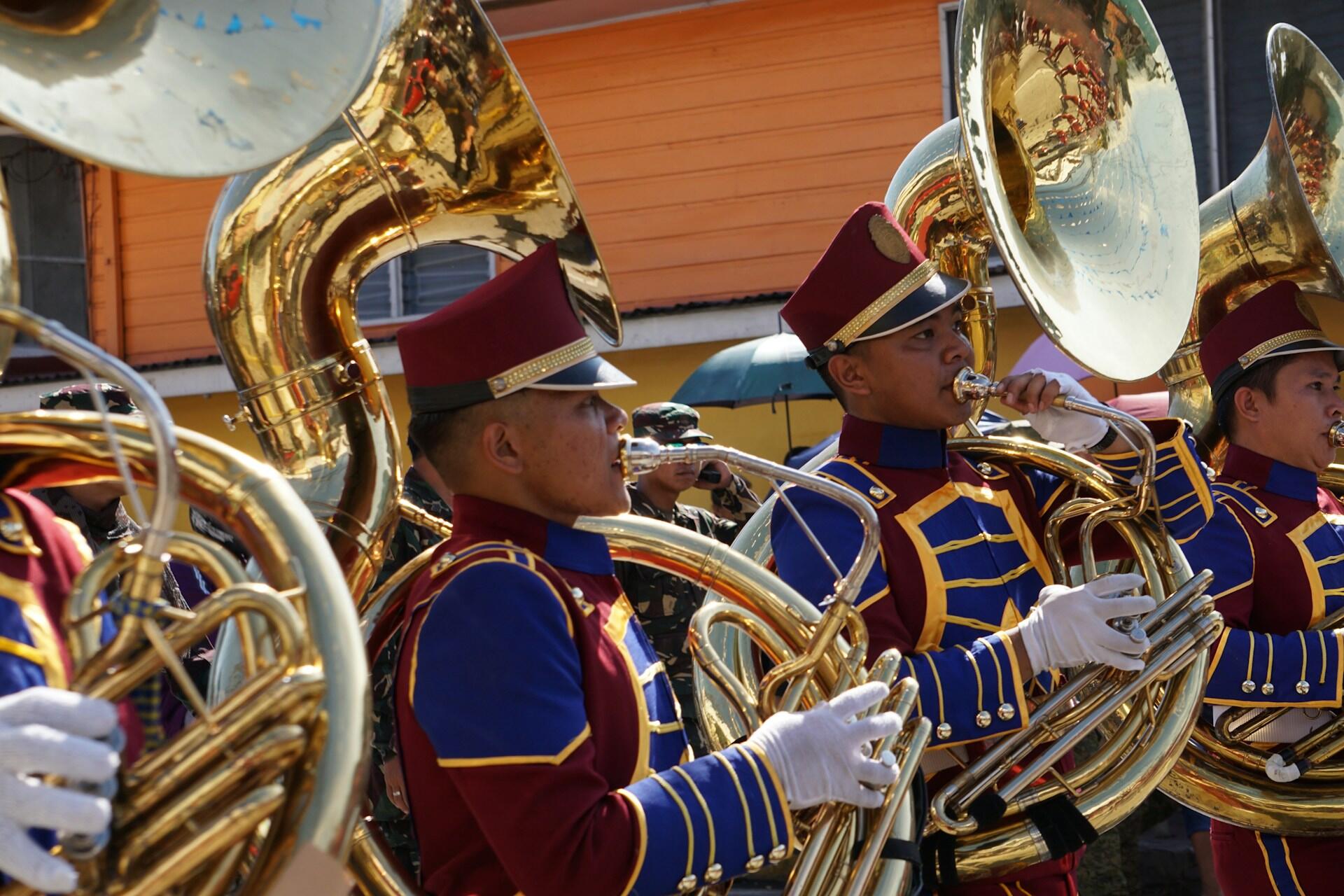 College marching band playing brass instruments
