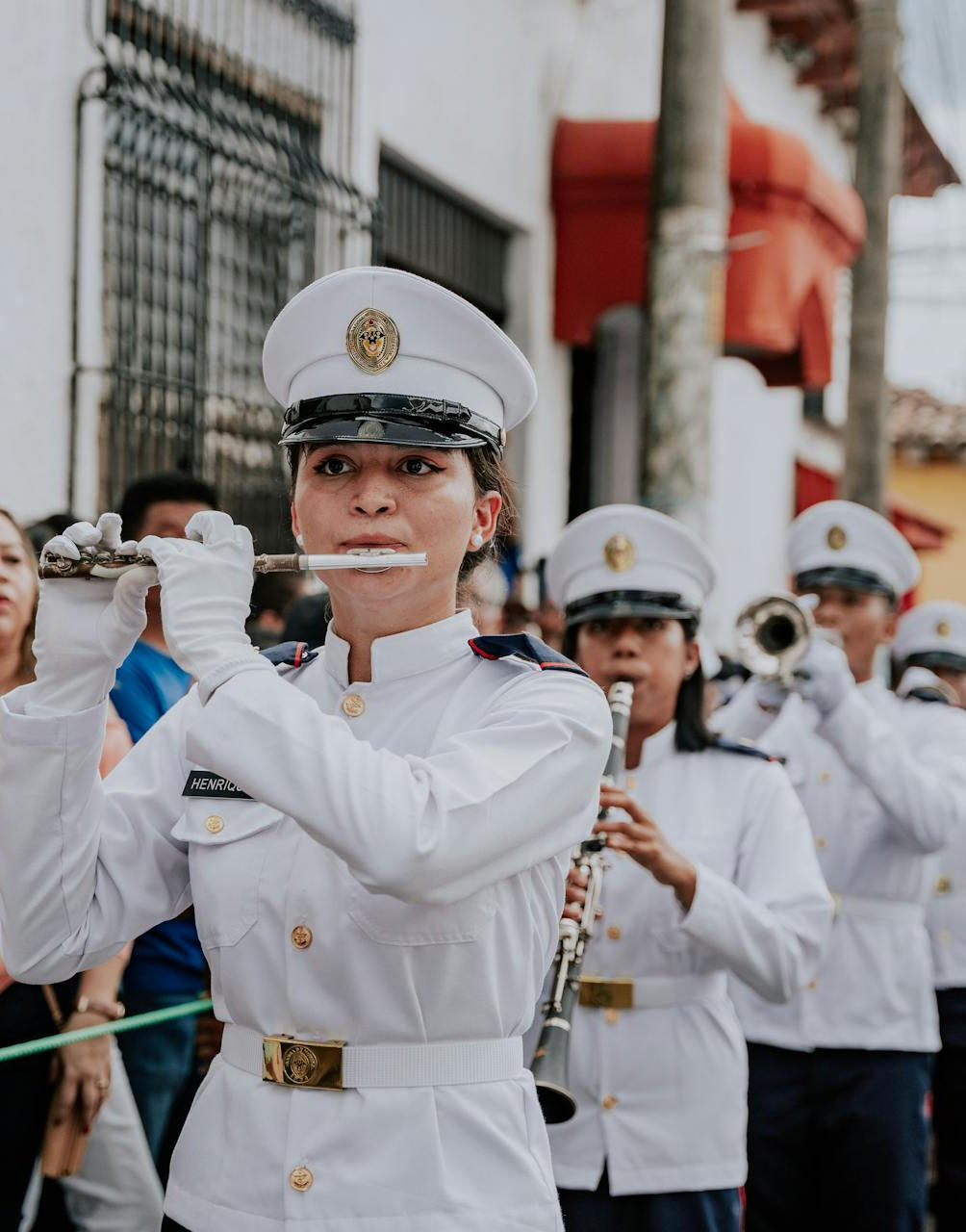 a flautist and clarinet player in a marching band