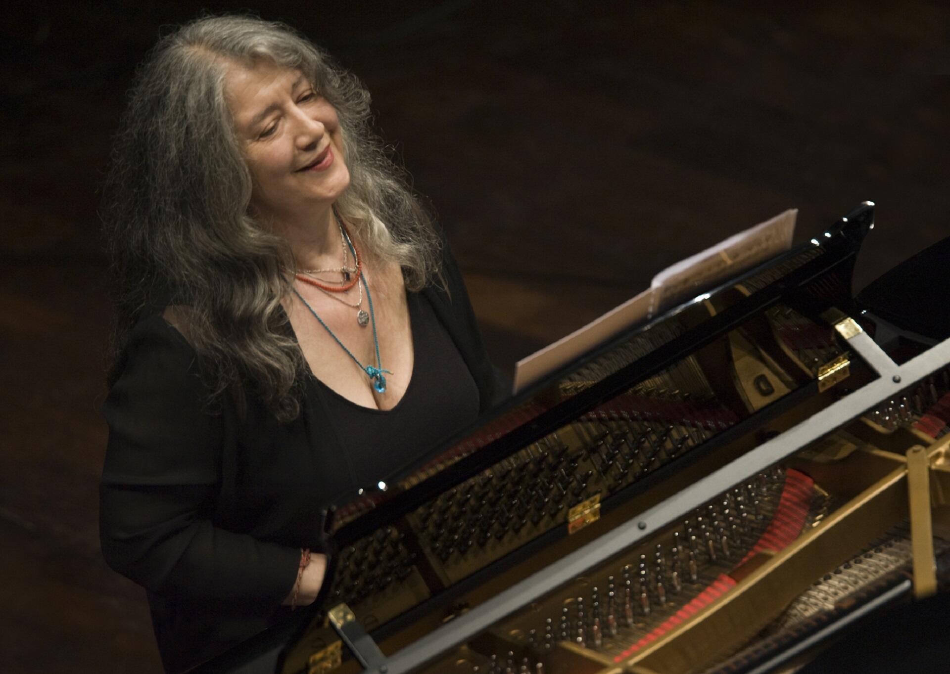 Martha Agerich sitting at the piano