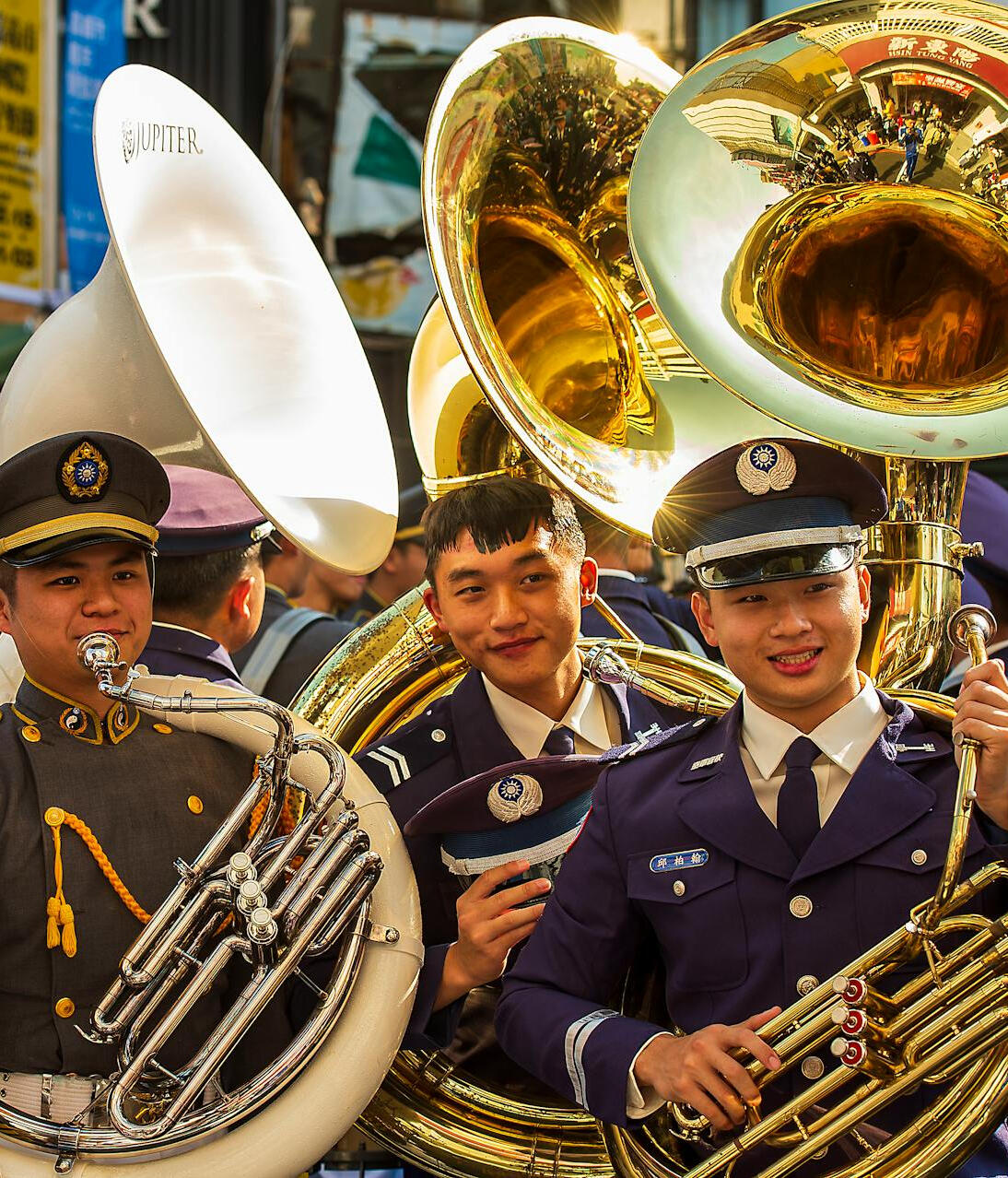 marching band members wearing sousaphones