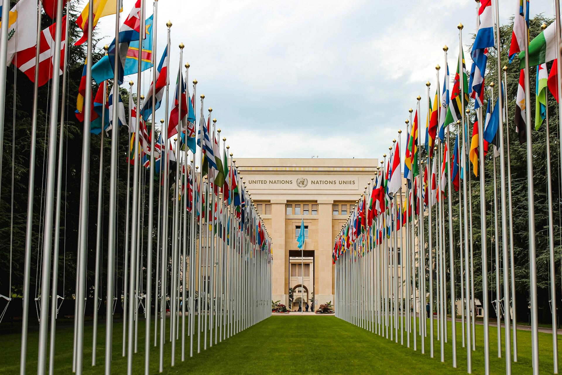 UN building with all the flags lined up on the side.
