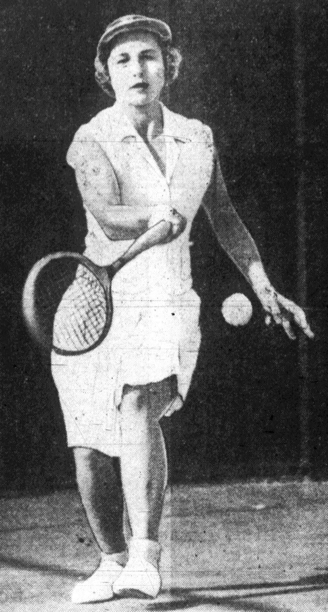black and white photo of Wills Moody playing tennis in 1941