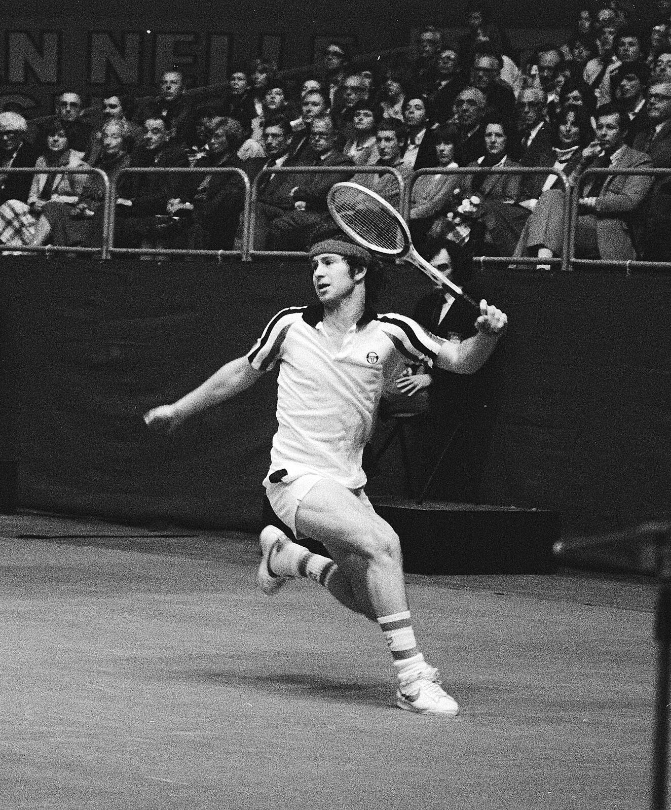 black and white photo of McEnroe playing in the ABN Tennis Tournament in Rotterdam, Netherlands in 1979