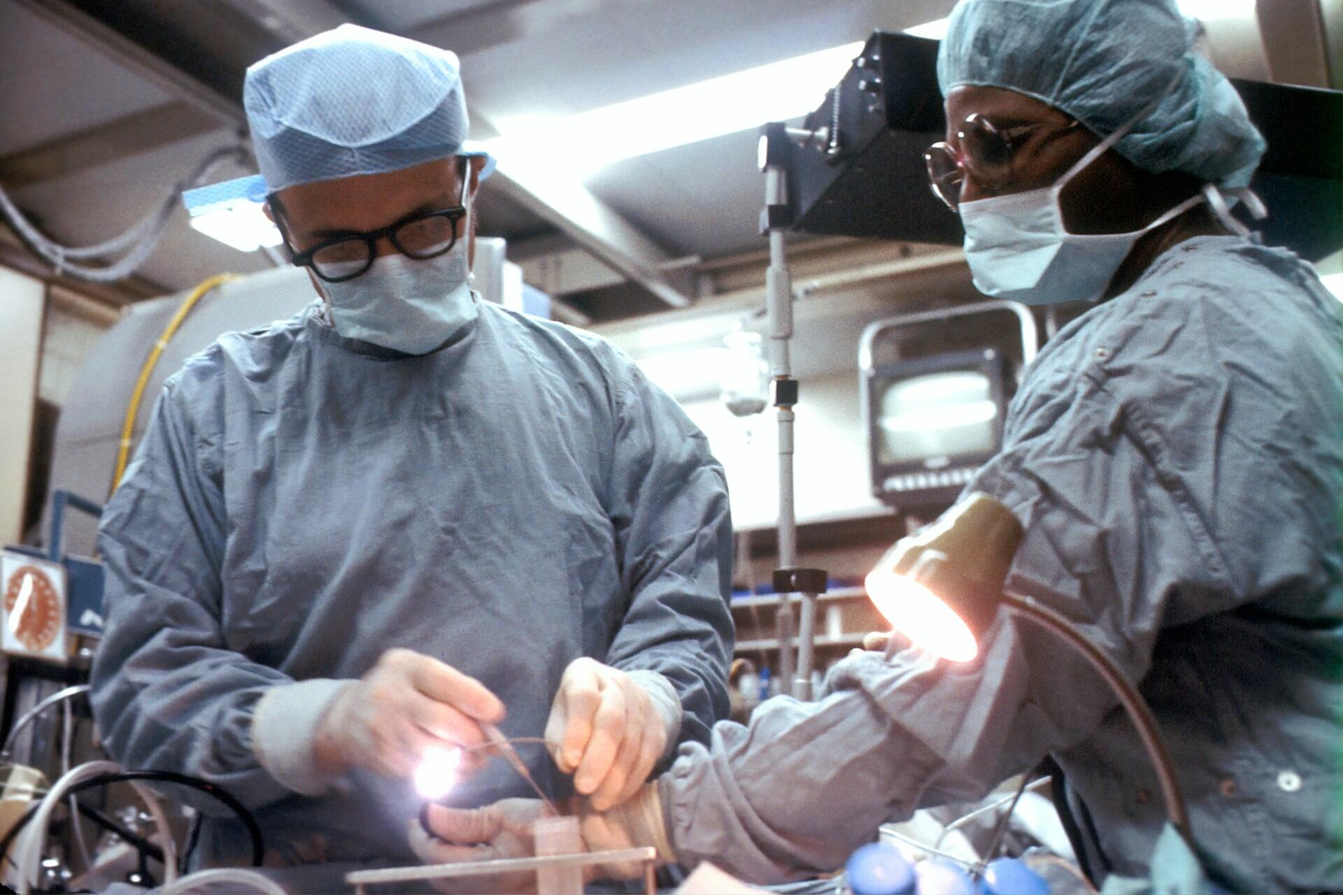 Two surgeons during surgery.