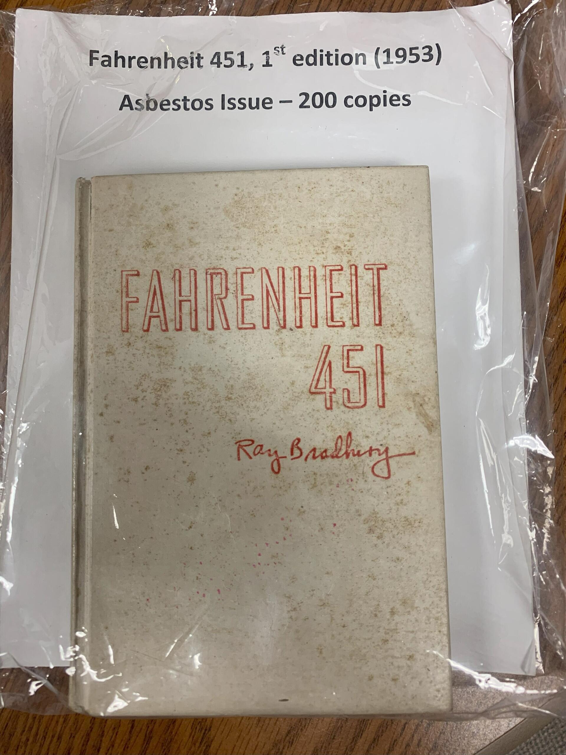 an asbestos-bound copy of "Fahrenheit 451" wrapped in plastic for safety