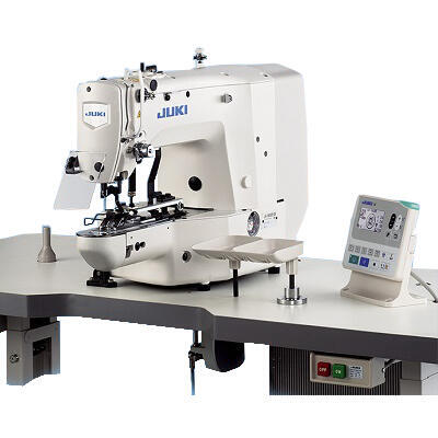 a computerized button sewing machine on a table