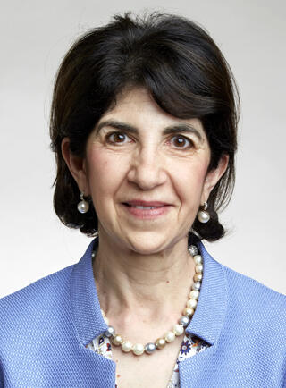 Fabiola Gianotti portrait photo in color.