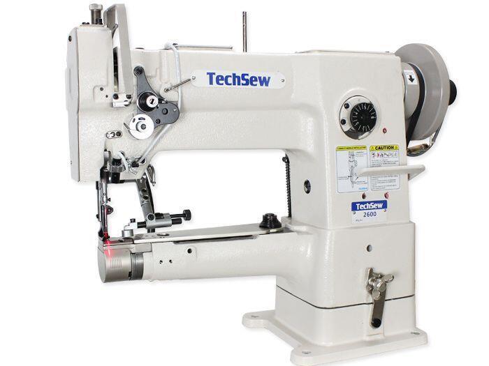 a picture of a white cylinder sewing machine