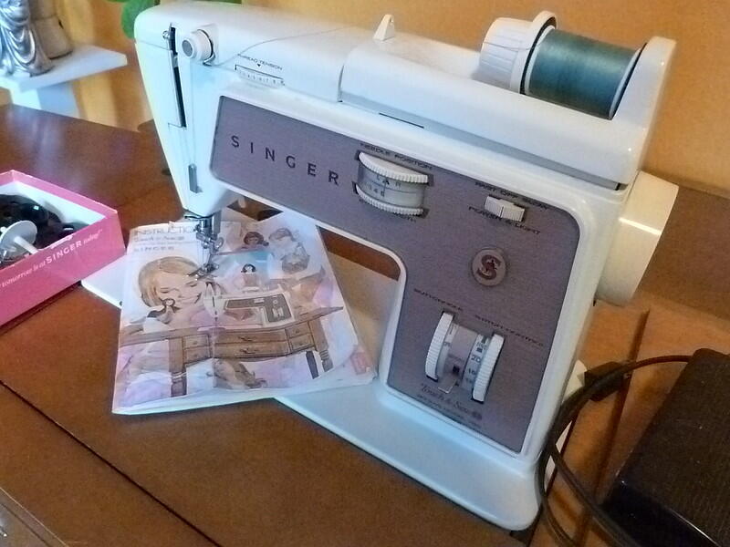 a zigzag sewing machine with grey thread