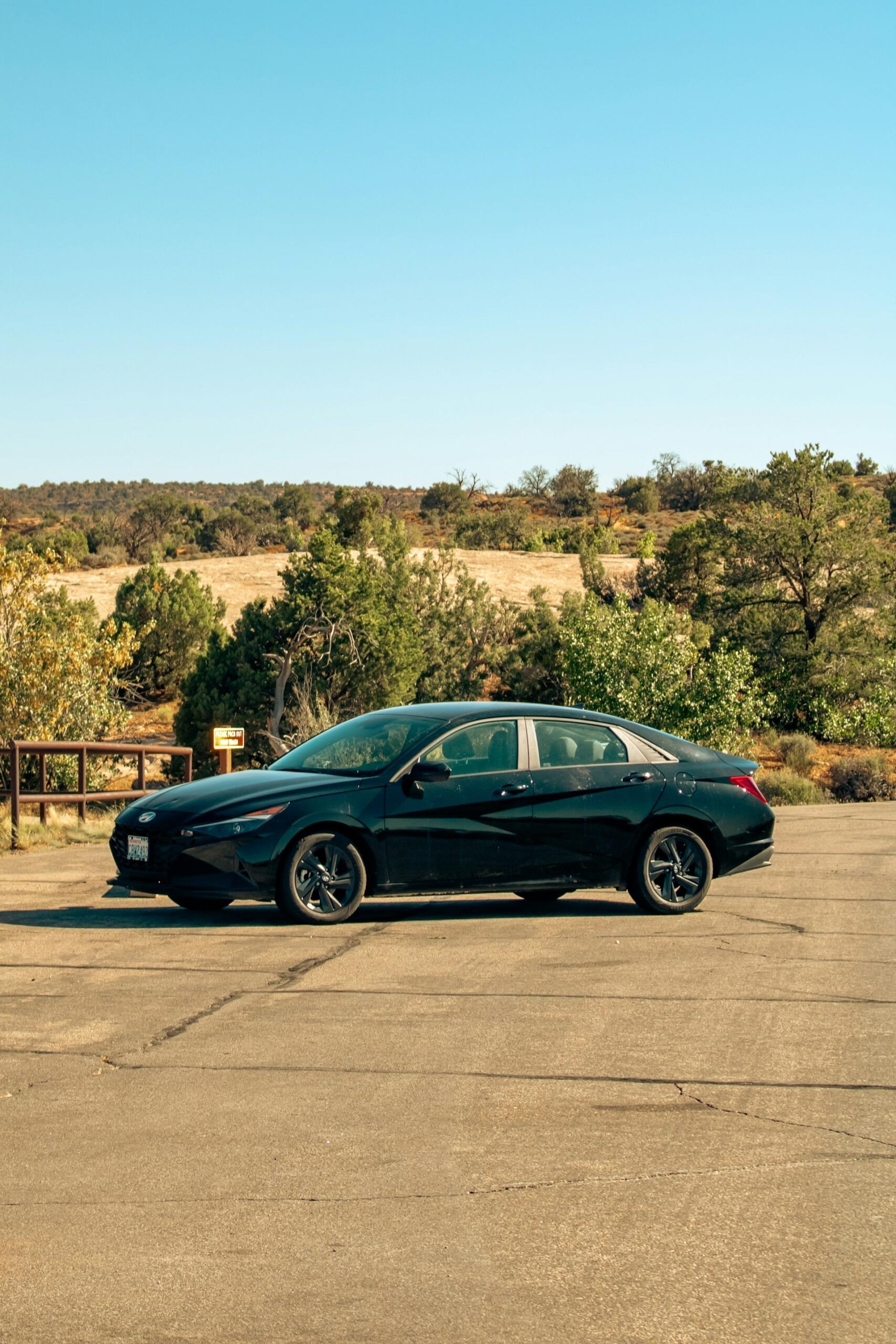 black Elantra parked outside