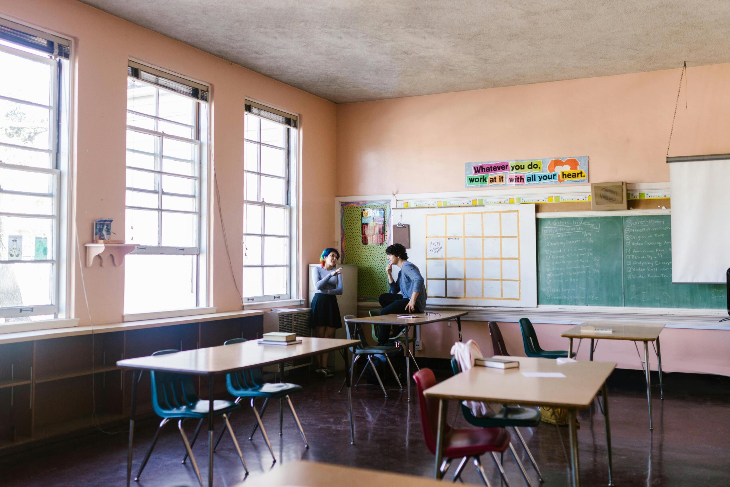 A classroom lies empty as students are out on their recess