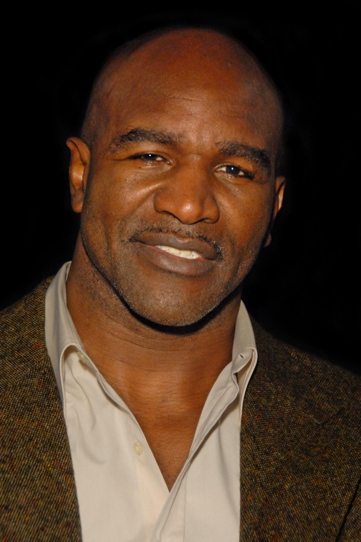 A portrait photo of Evander Holyfield.