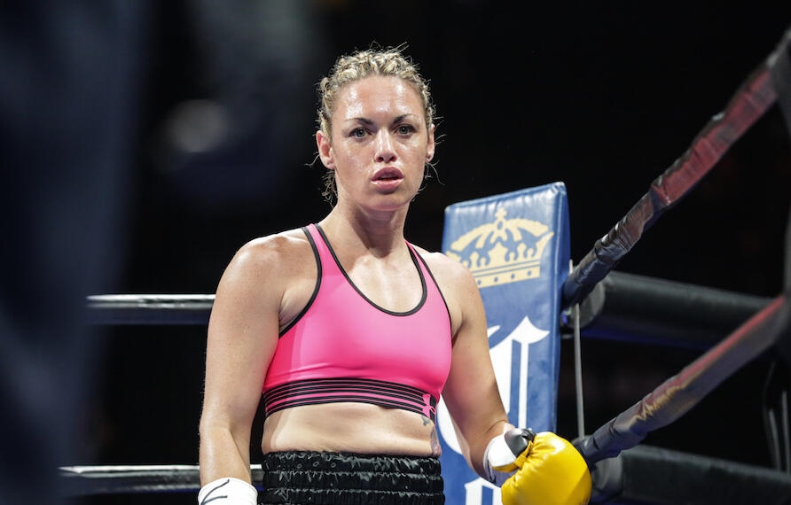 Heather Hardy in a boxing ring.