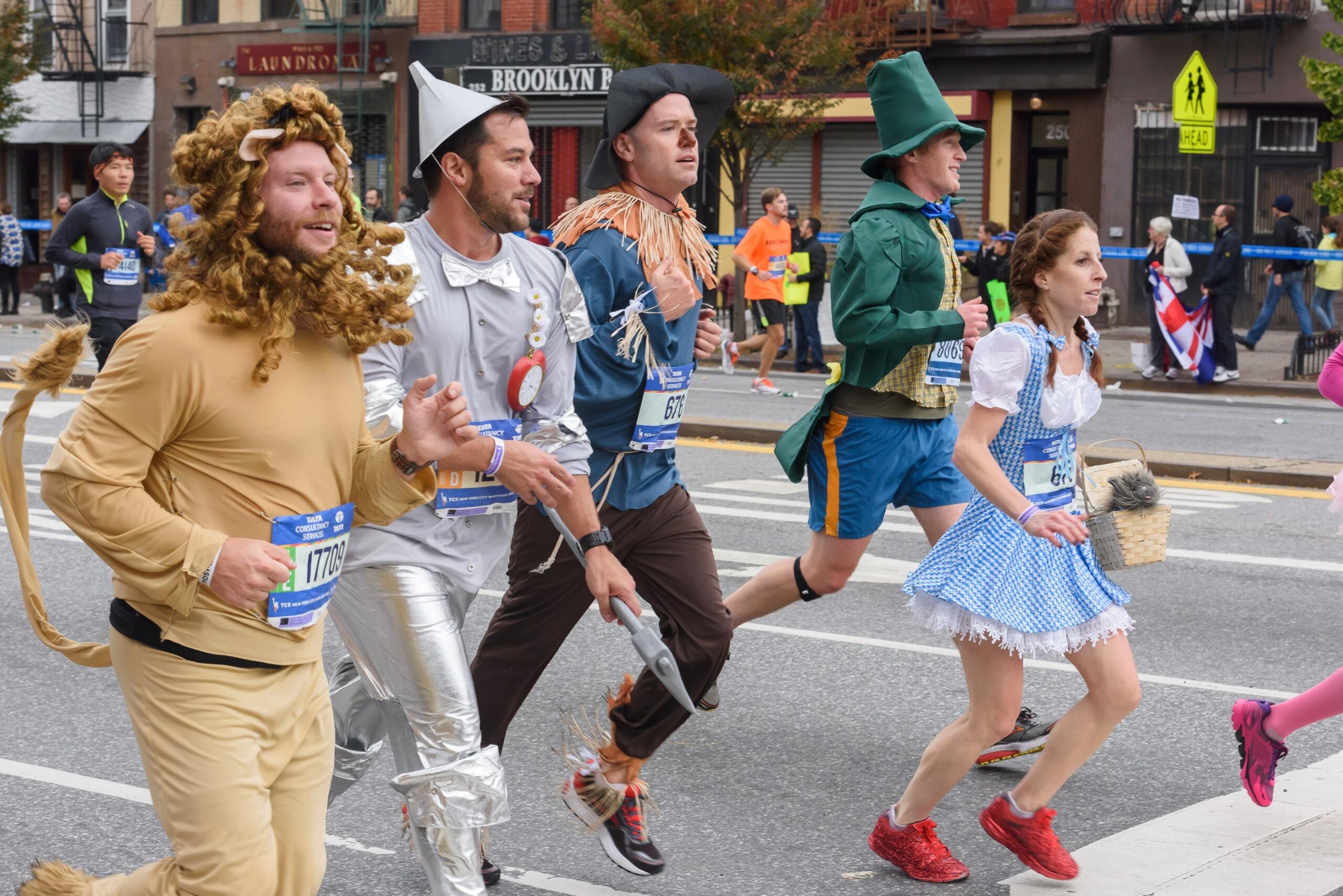 runners in the NYC Marathon dressed as characters from The Wizard of Oz