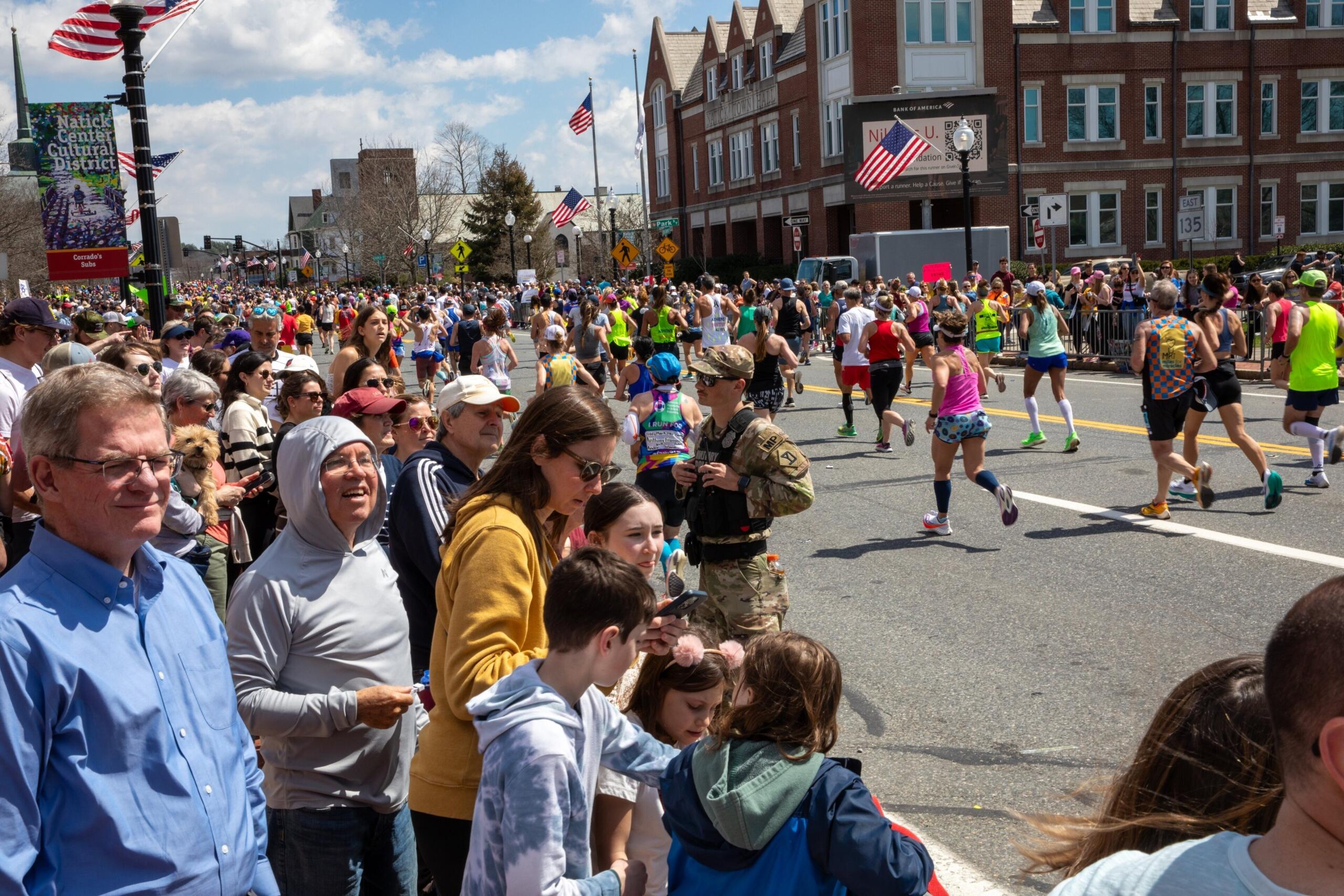 photo of the crowds cheering runners on in Natick