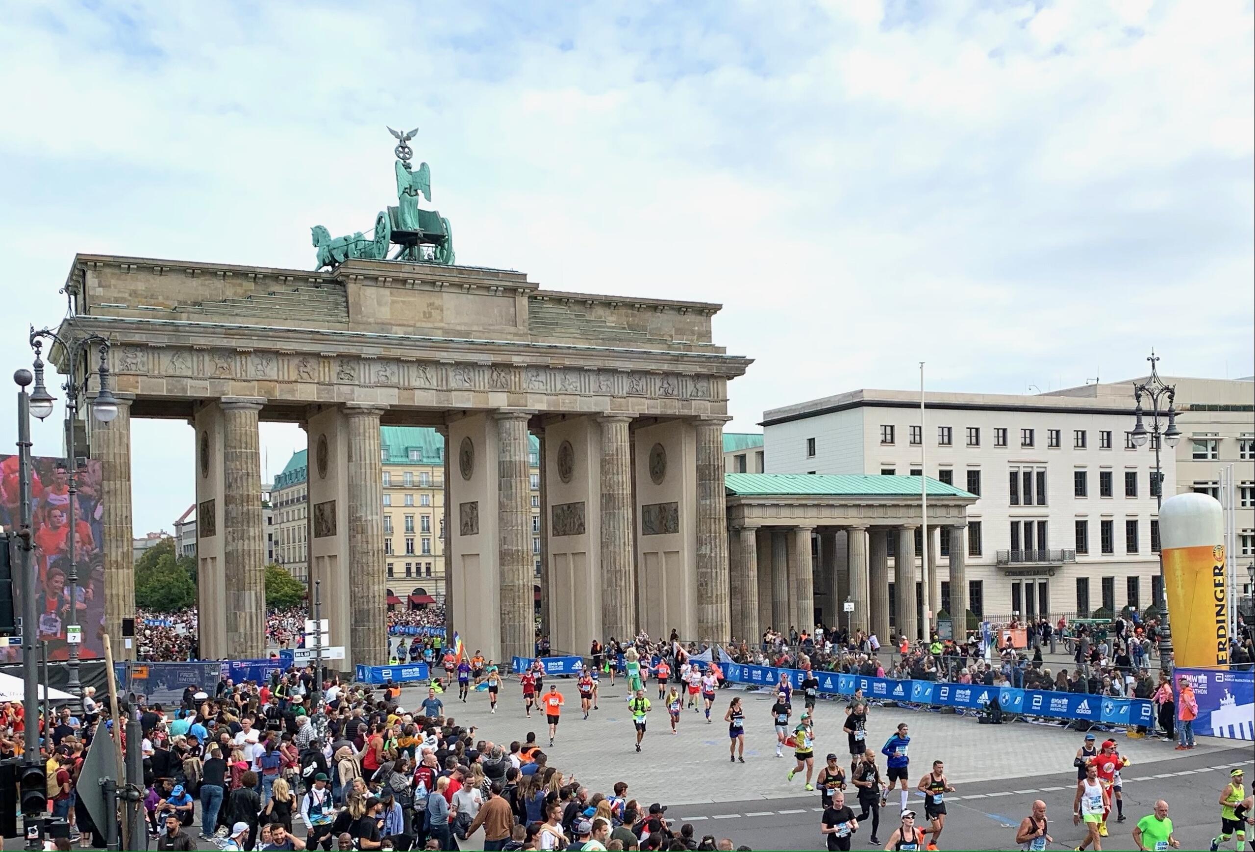 Runners for the Berlin marathon by the Brandenburg gate.