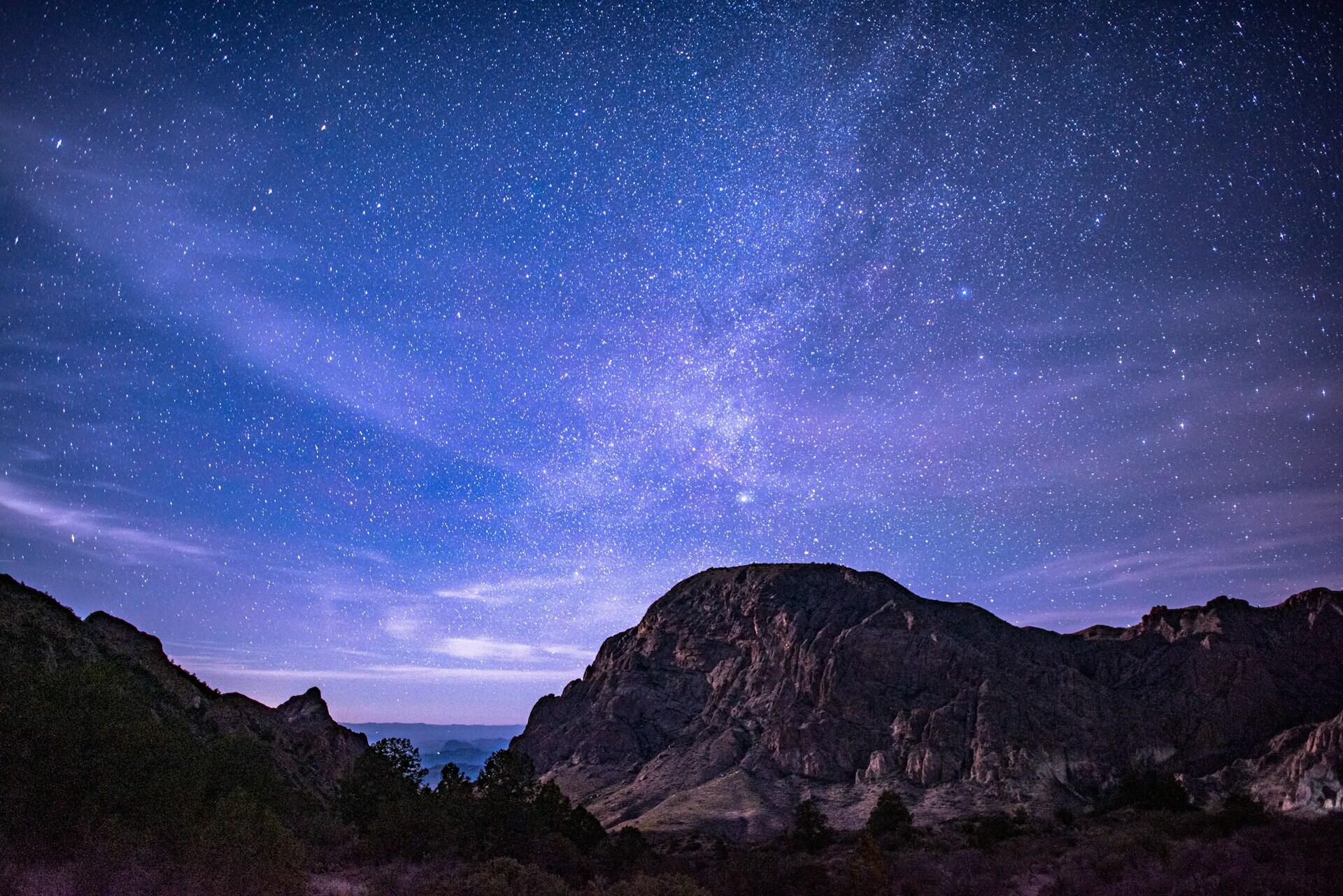 Mountains at Big Bend against a blue and purple night sky