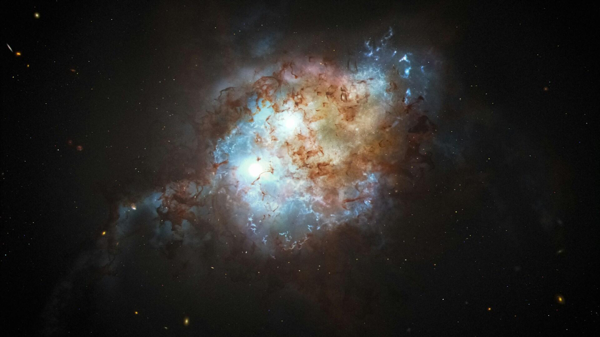 A cosmic cloud in space showcases swirling blue, white, and red gases, illuminated at the center, conveying a sense of mystery.