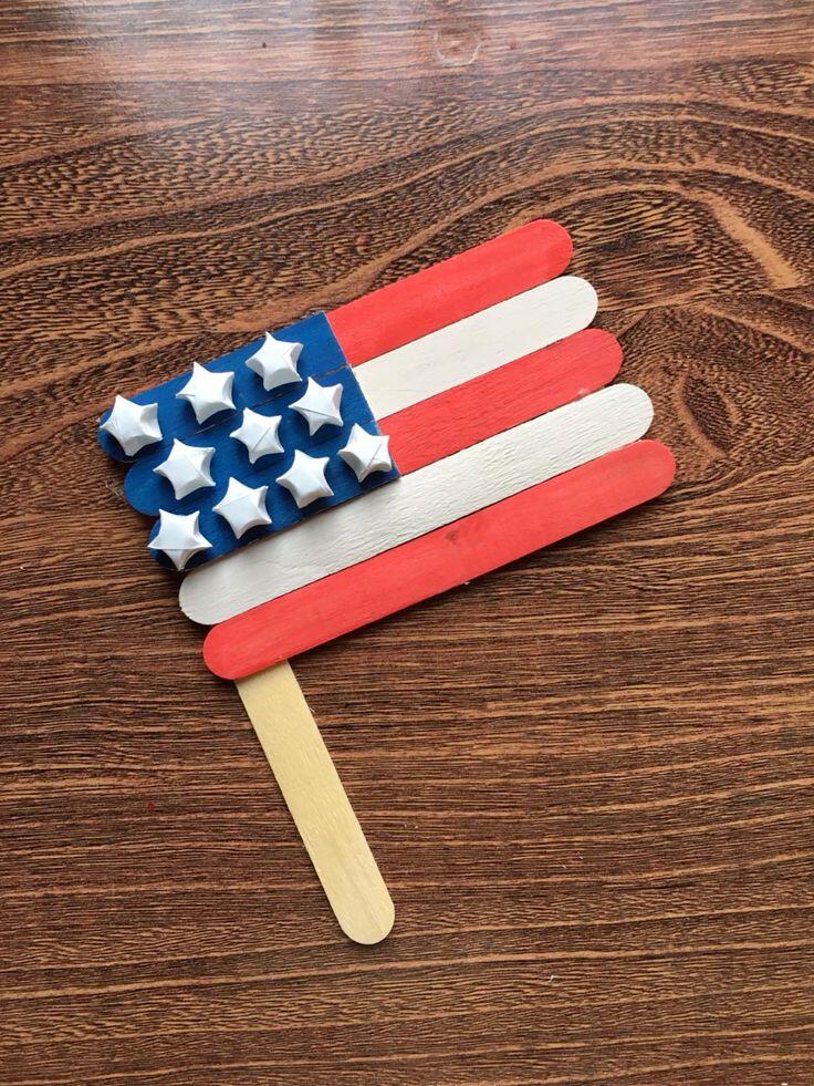 popsicle stick flag in red, white and blue with white stars