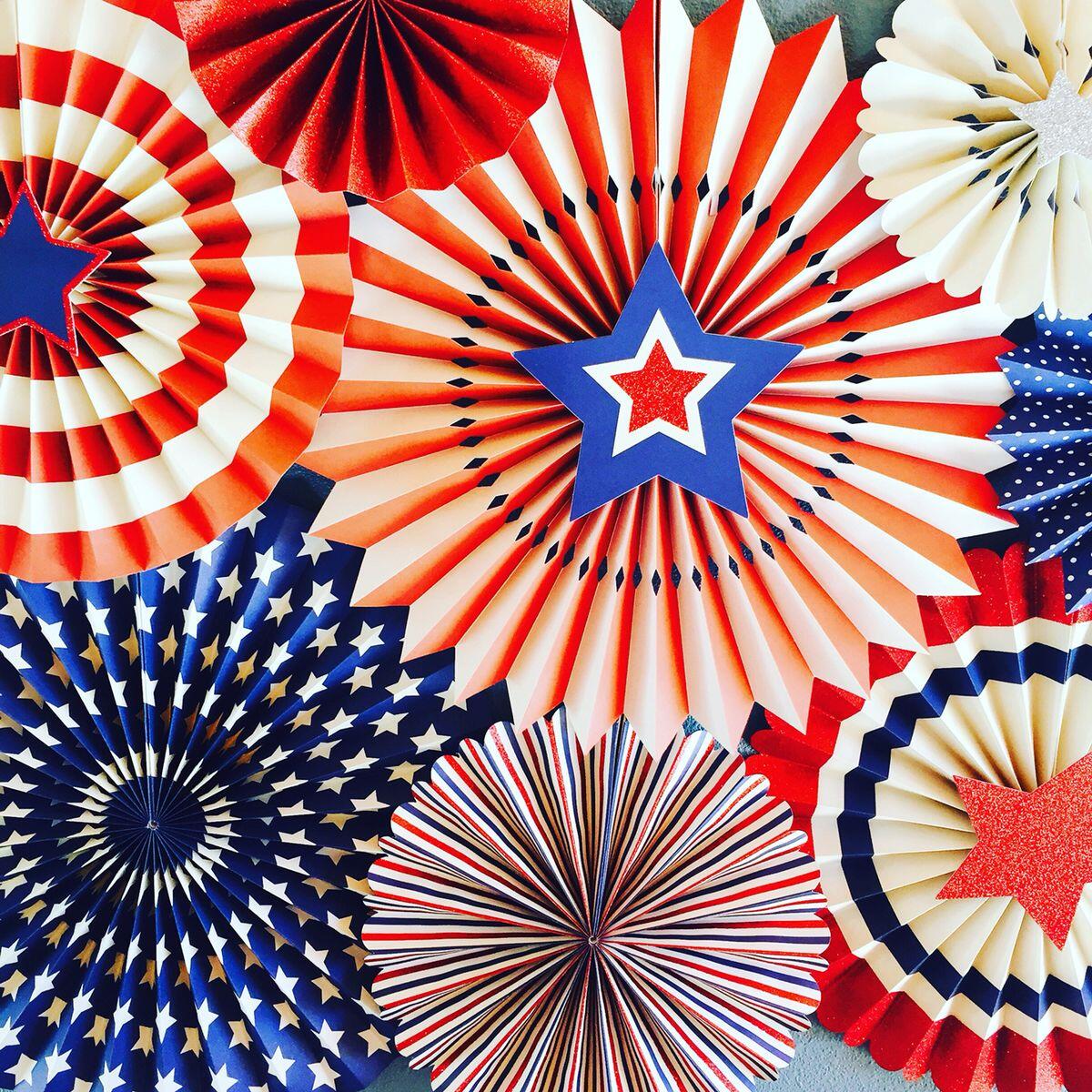 various paper fans in red, white and blue with stars