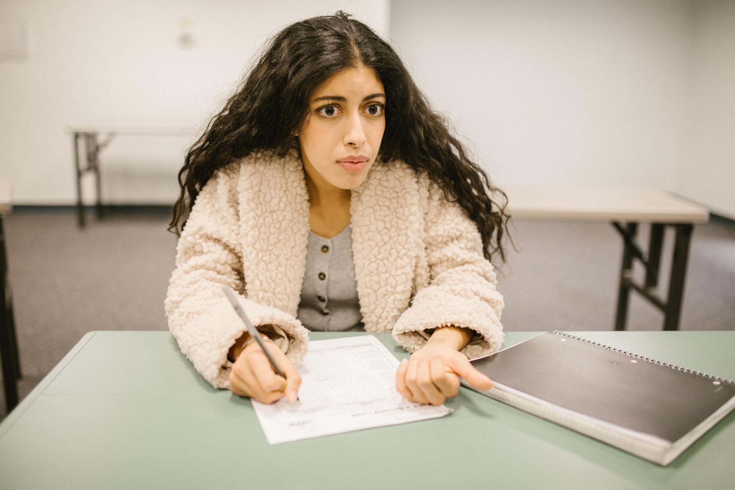 A student is in the middle of her SAT exam
