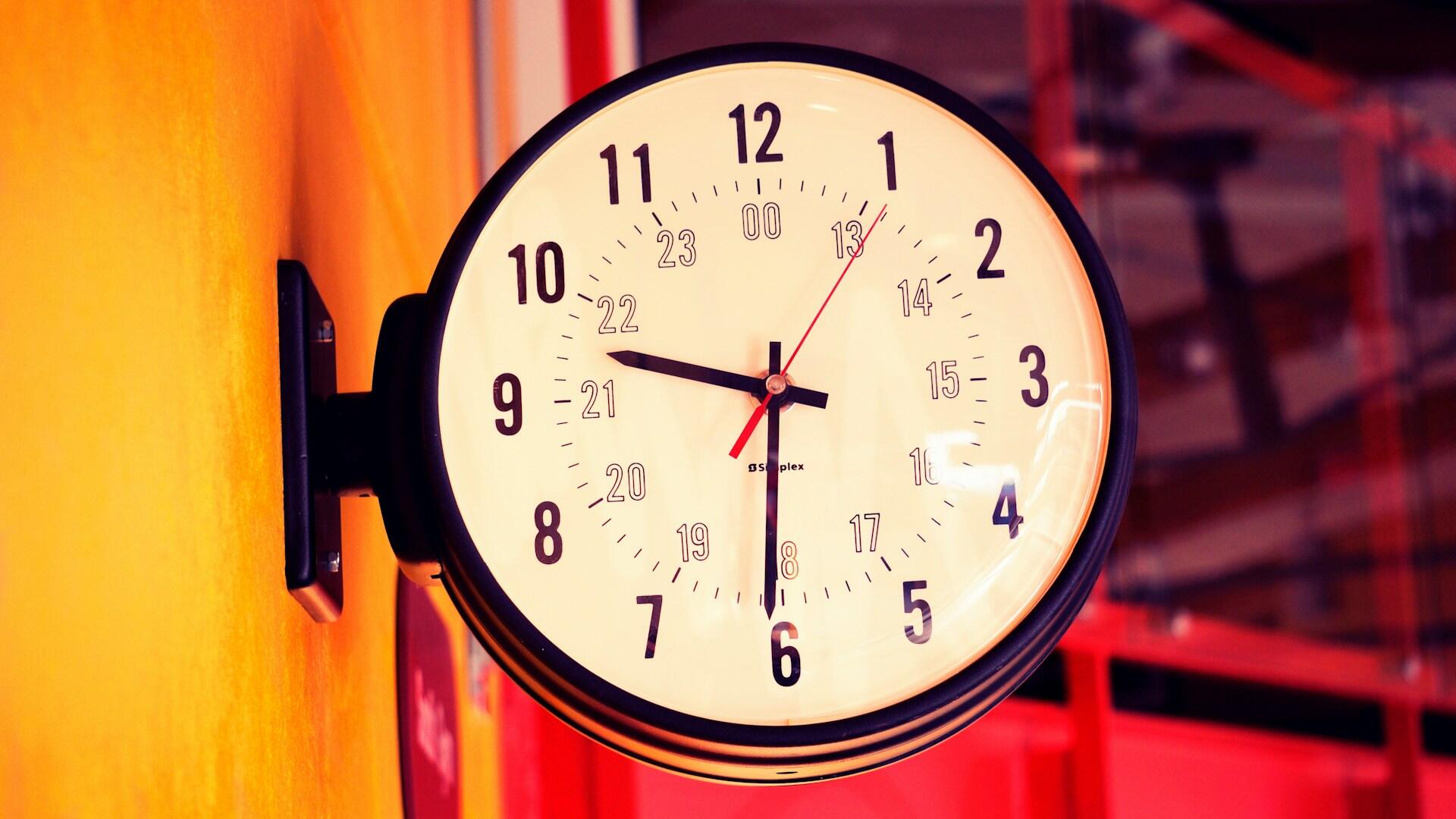 a clock mounted to a wall