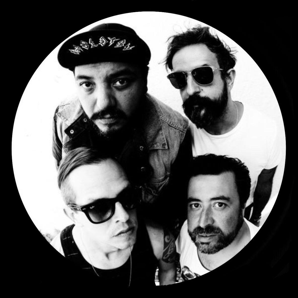 black and white picture of band members of music group Molotov