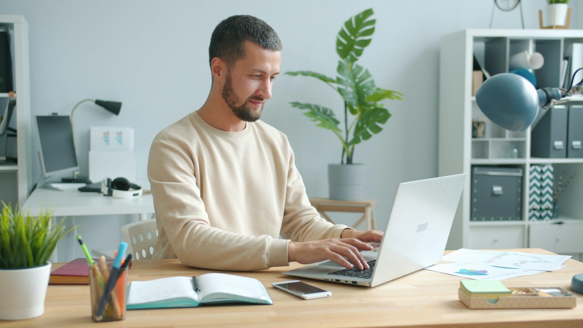 Student using their computer to study