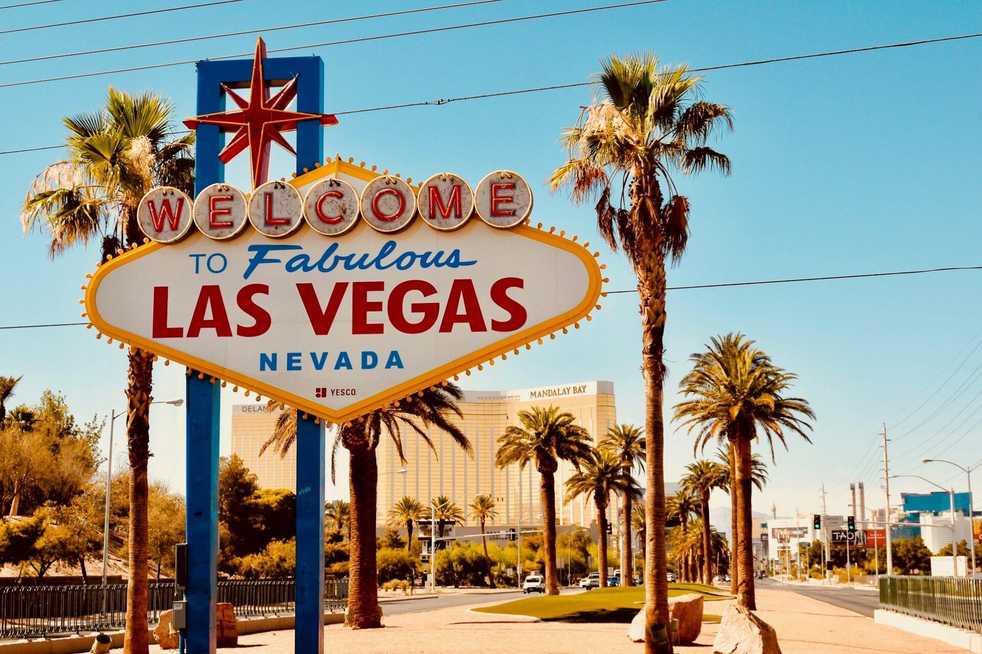 Welcome to Fabulous Las Vegas sign surrounded by palm trees